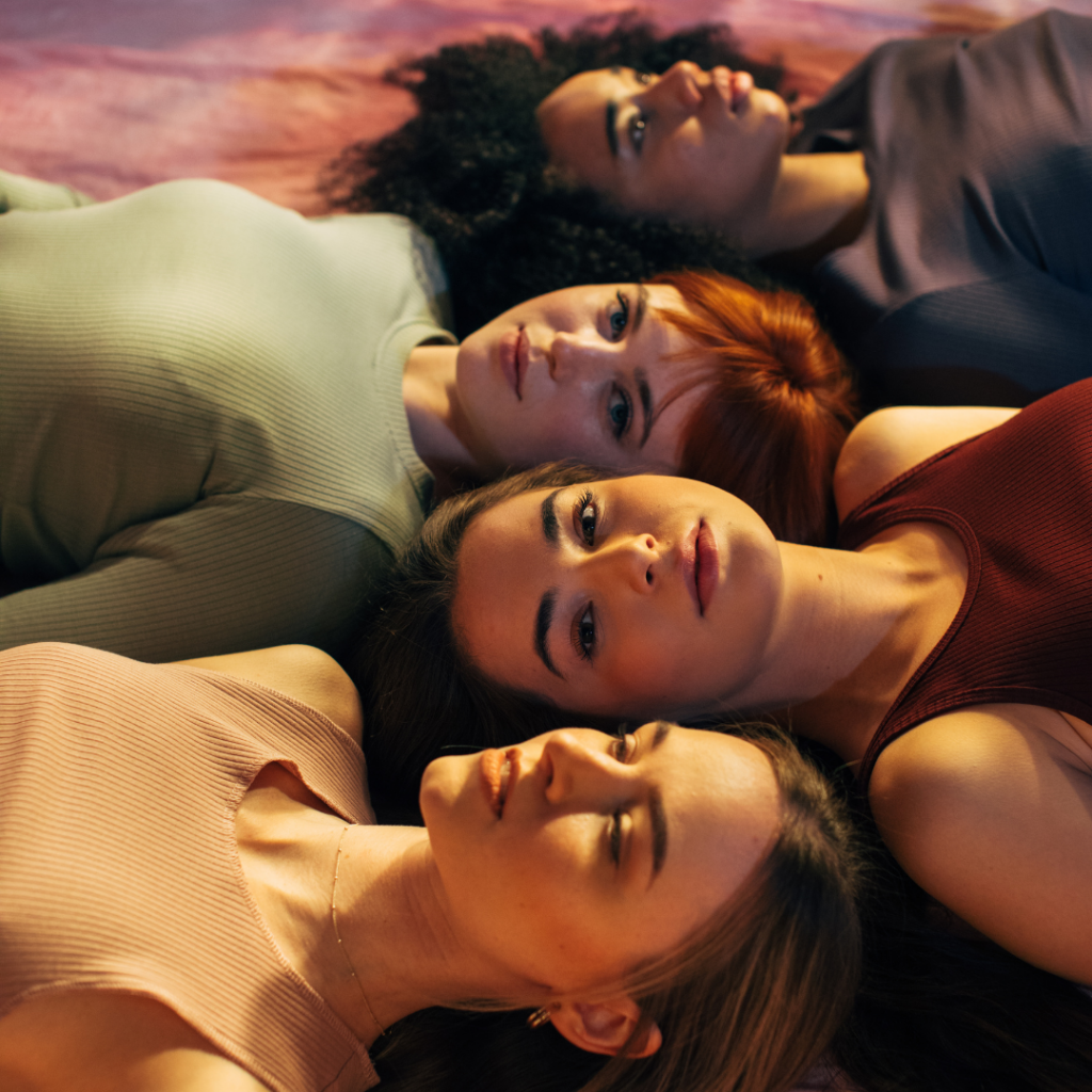4-empowered-women-laying-down